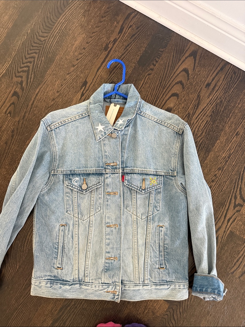 Light Wash Levi Denim Jacket with Embroidered Details